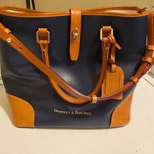 Blue and brown, Dooney and Bourke Handbag. Big. Brand new. Used maybe once.